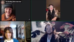 A frame from the interview video. All four people are smiling.